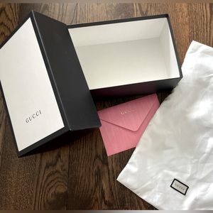 Gucci box, duster, and envelope